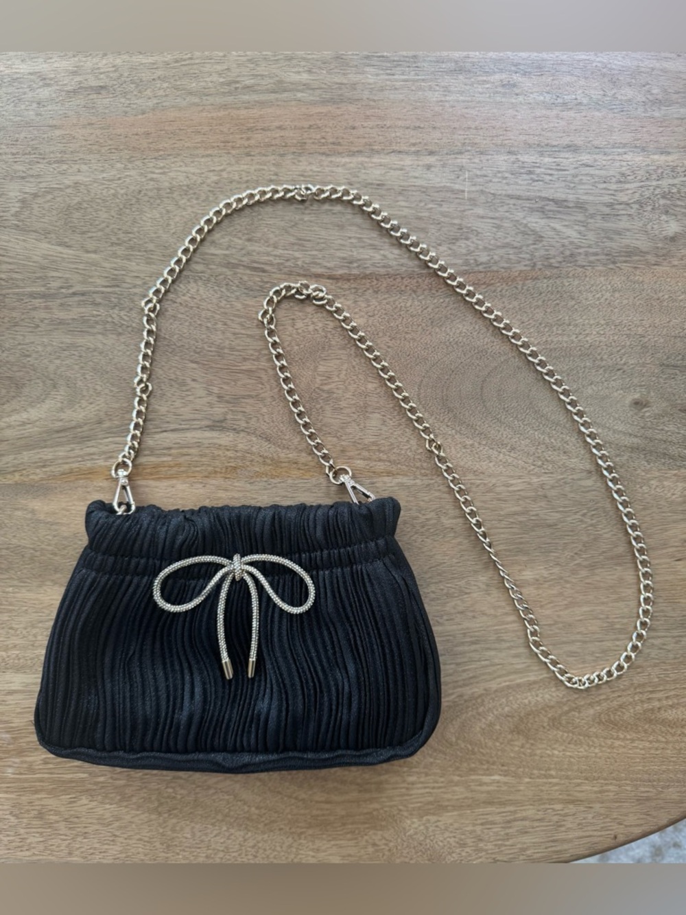 Black Pleated Bag with Bow Accent